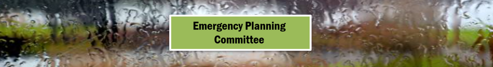 Heavy rainfall on glass with words Emergency Planning Committee