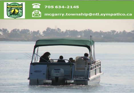 Pontoon boat on the water with the McGarry logo showing telephone number and email address