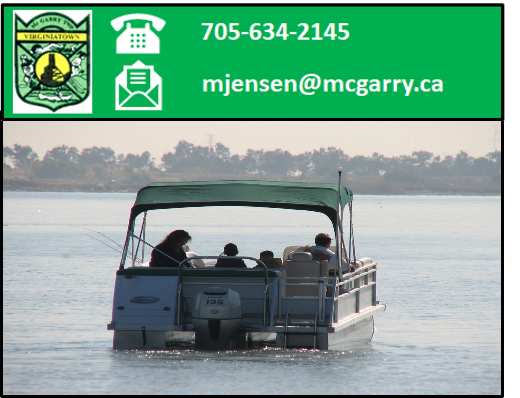 Pontoon boat on the water with the McGarry logo showing telephone number and email address