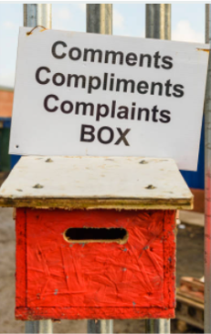 box with sign that says complaints comments compliments